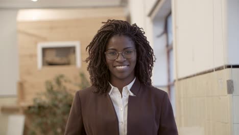 front view of confident businesswoman looking at camera