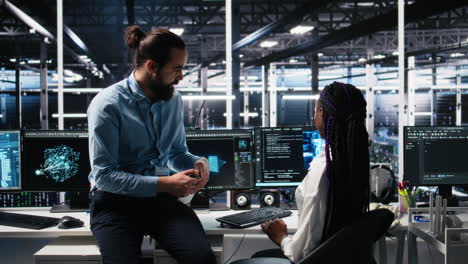 system administrator and employee in data center coding with generative ai