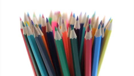 color pencils rotating in a pencil holder