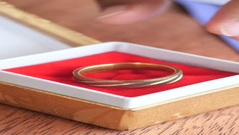 close up of a ring in a box