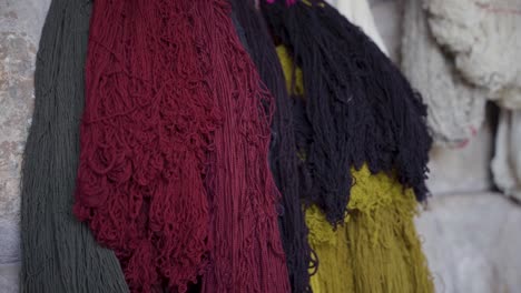 Detail-of-the-natural-hand-dyed-wool-created-by-local-artisans-in-Chinchero,-Cuzco,-Peru