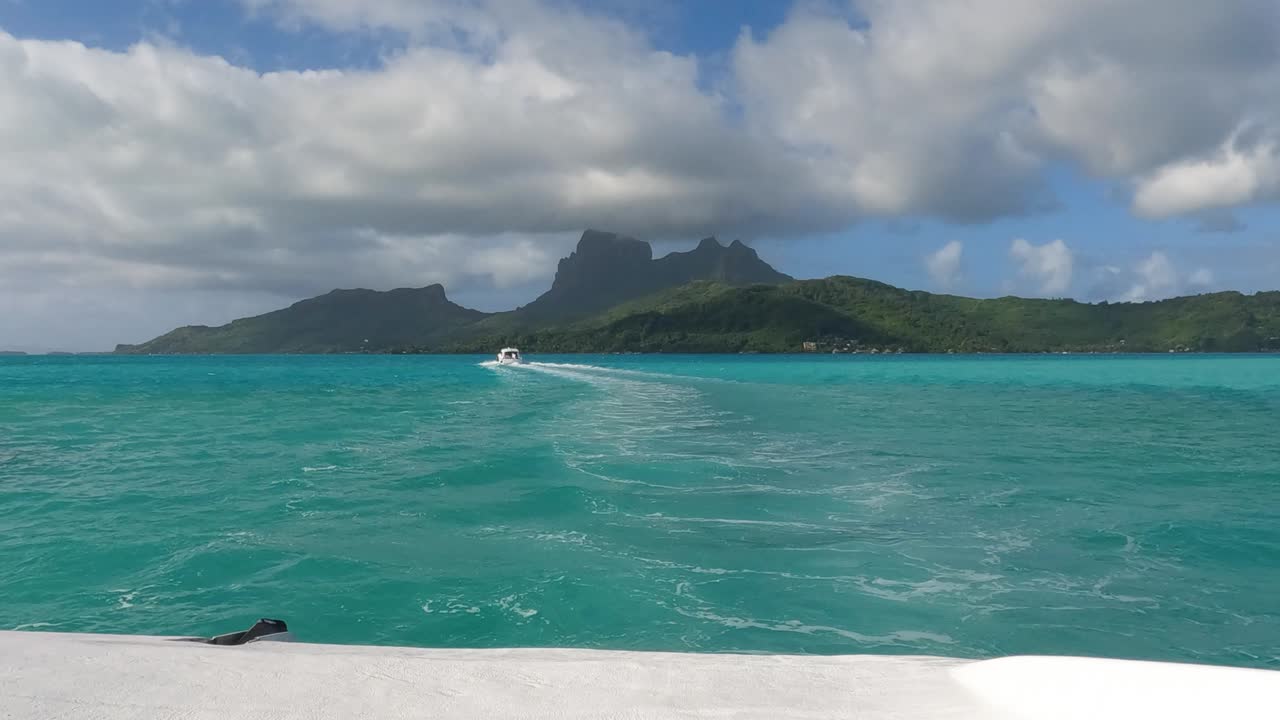 Boats Sailing in Bora Bora Lagoon, Turquoise Water and Volcanic Island, Passenger Point of View