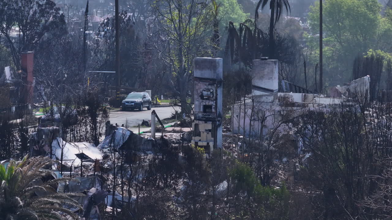 Aftermath of a Wildfire: Destroyed Homes and Charred Landscape