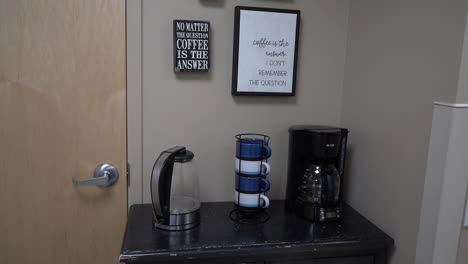 coffee station in dental office with coffee pot and cups