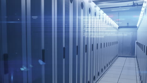 computer servers in a server room with glowing lights
