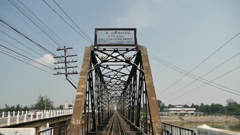 antique chulalongkorn rail bridge in ratchaburi province, thailand