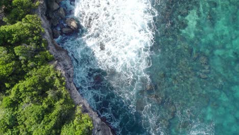 Top-View-Of-Rough-Waves-Hitting-On-The-Rocks-In-Porte-d'Enfer,-Guadeloupe,-France