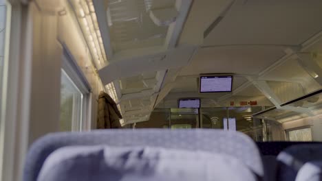 inside a moving ice train, showcasing modern interior, spacious and clean design