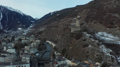 Aerial-of-La-Bâtiaz-Castle-overlooking-the-city-of-Martigny-in-Switzerland