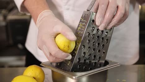 chef zesting a lemon