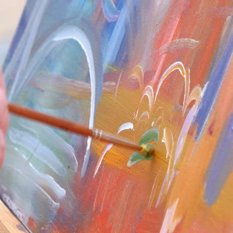 painting it with watercolors on canvas