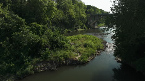 scenery of lush forest and river in oronoco, minnesota, usa - drone shot