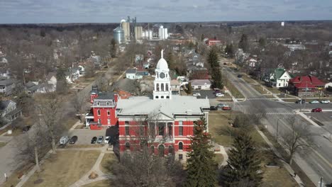 historic eaton county courthouse in charlotte, michigan with drone flying over with skyline