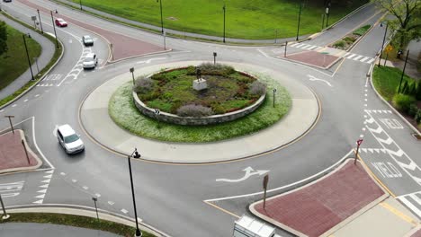 drone shot slow dolly forward and tilt down, aerial view of traffic circle roundabout in hershey pennsylvania