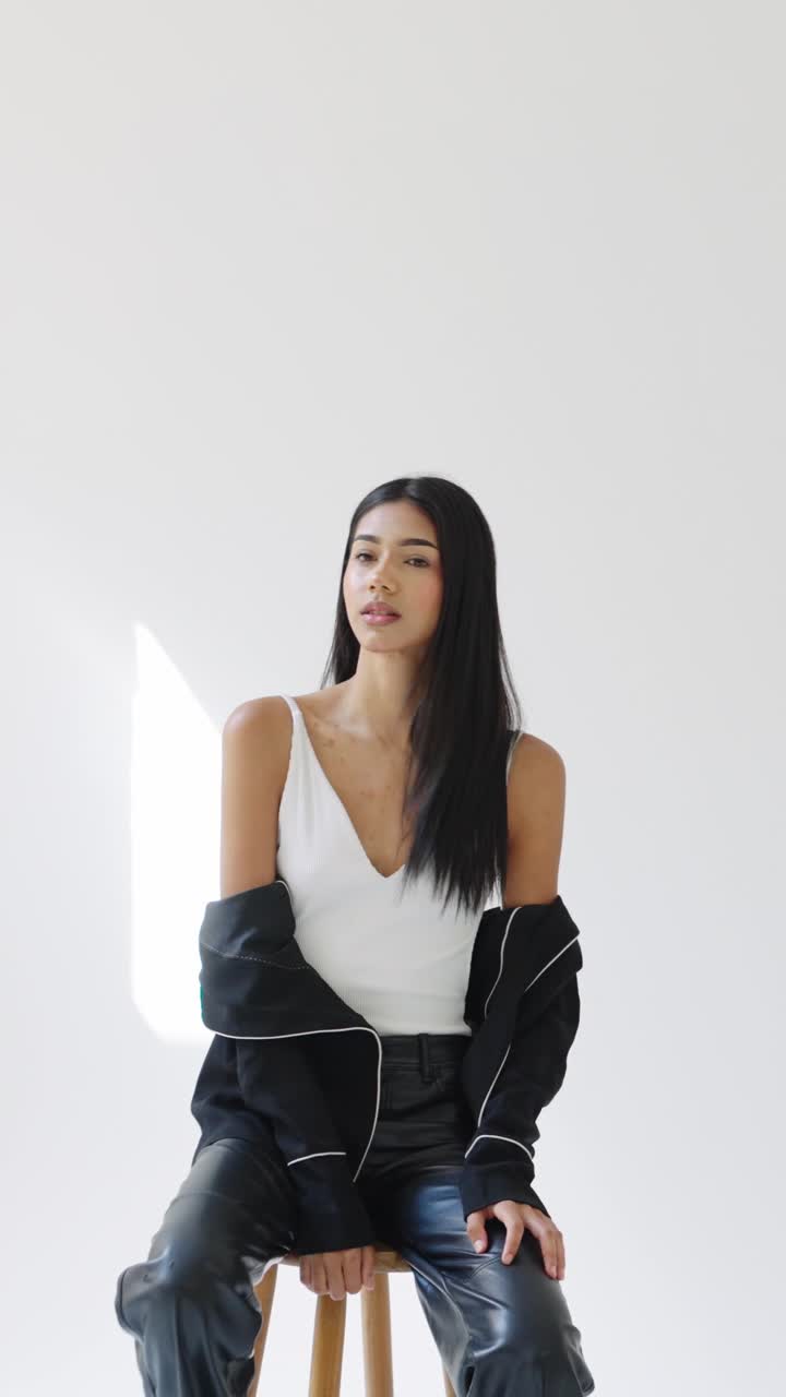 Fashion portrait of a woman in studio