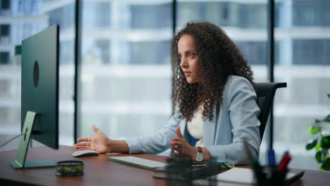 surprised boss reading unbelievable news pc monitor. shocked girl smiling office