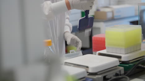 extracting samples in a lab in a close up shot