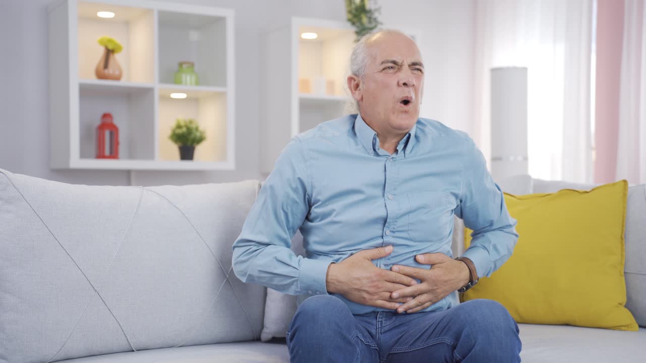Old man with stomachache.
