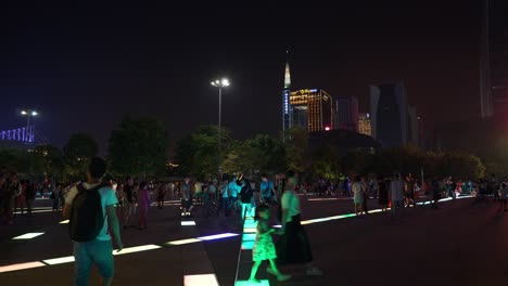 night illuminated guangzhou city crowded square walking panorama 4k china