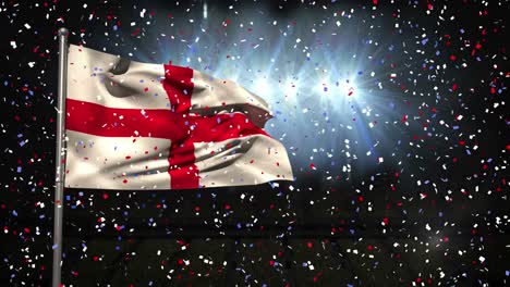 animation of falling confetti over waving flag of england against lights in empty stadium