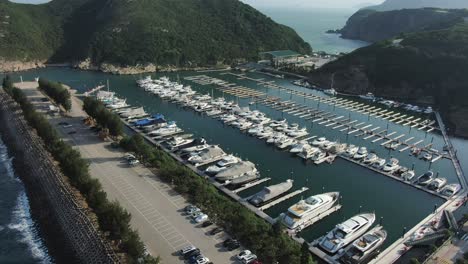 Hong-Kong-marina-and-Typhoon-shelter-small-boats-on-a-clear-Summer-day,-Aerial-view