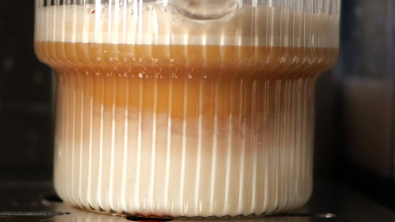 Layered Coffee Drink in a Glass Container
