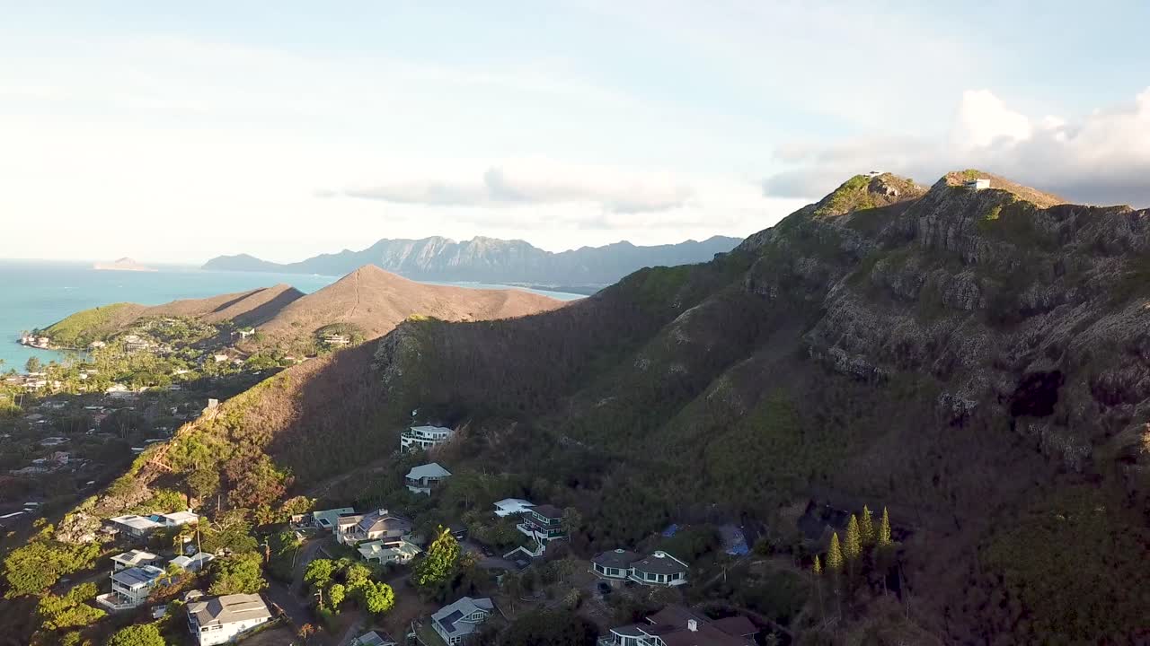 Aerial view of a mountainous landscape with residential area