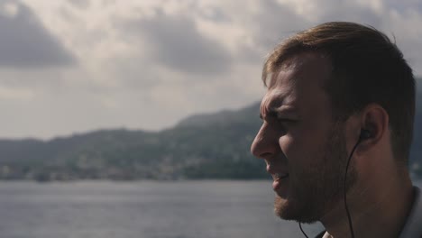 headphones for listening to music. the guy listens to music through bluetooth headphones.