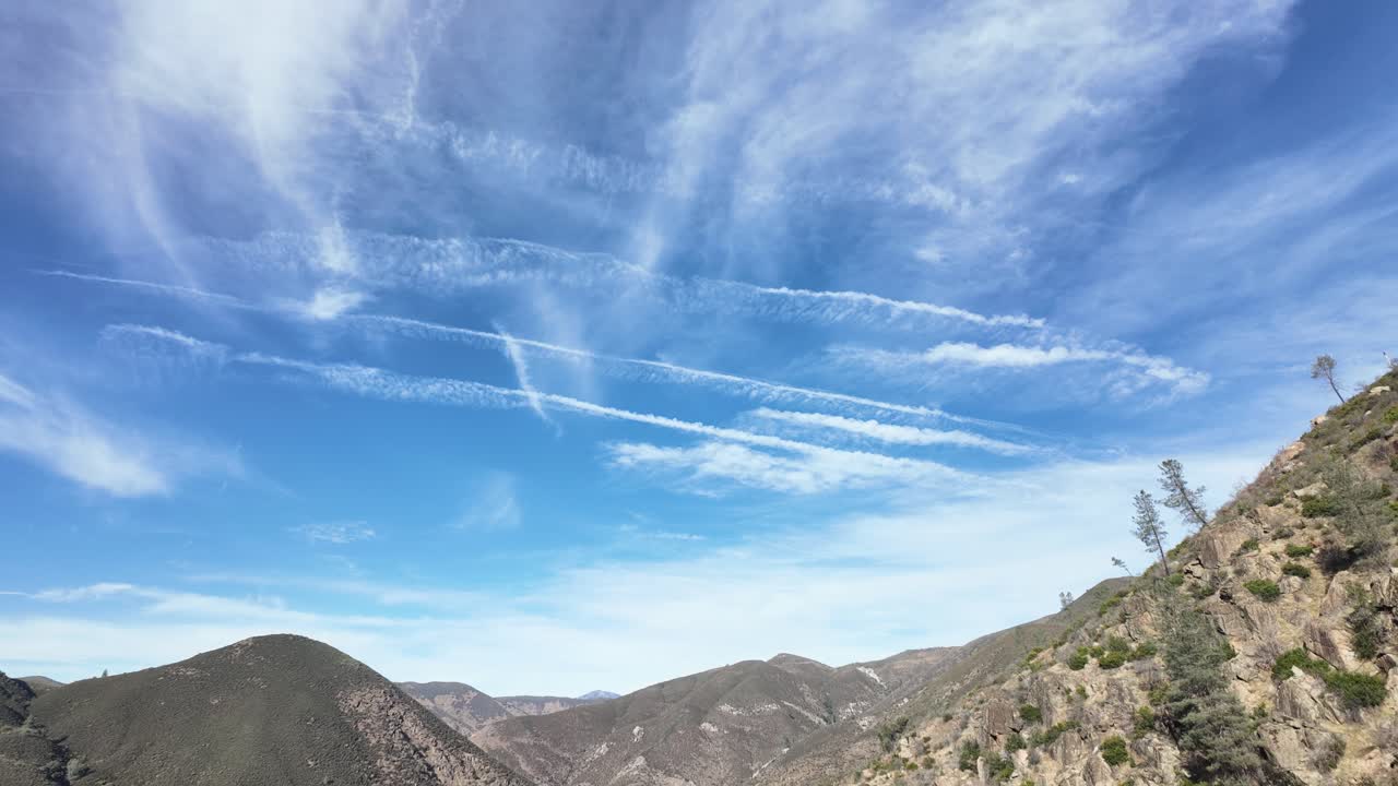 A time-lapse from a Midpines hilltop shows clouds drifting across wide open skies, revealing the steady rhythm of light and shadow moving over the surrounding California landscape