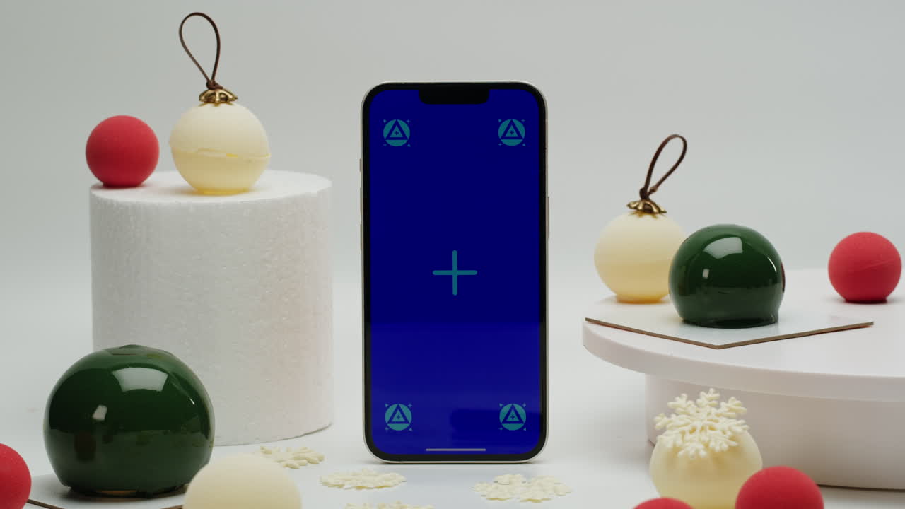 Smartphone Display with Christmas Ornaments