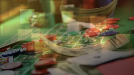cartas de juego, fichas y efectivo cayendo en la mesa de ruleta y luces cuadradas en primer plano en el casino