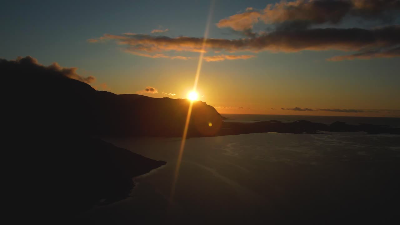 Explore the amazing midnight sun of Lofoten with this high-resolution 4K drone footage. Cinematic views, raw nature, and dramatic sunset make this stock footage a must-have for creators.