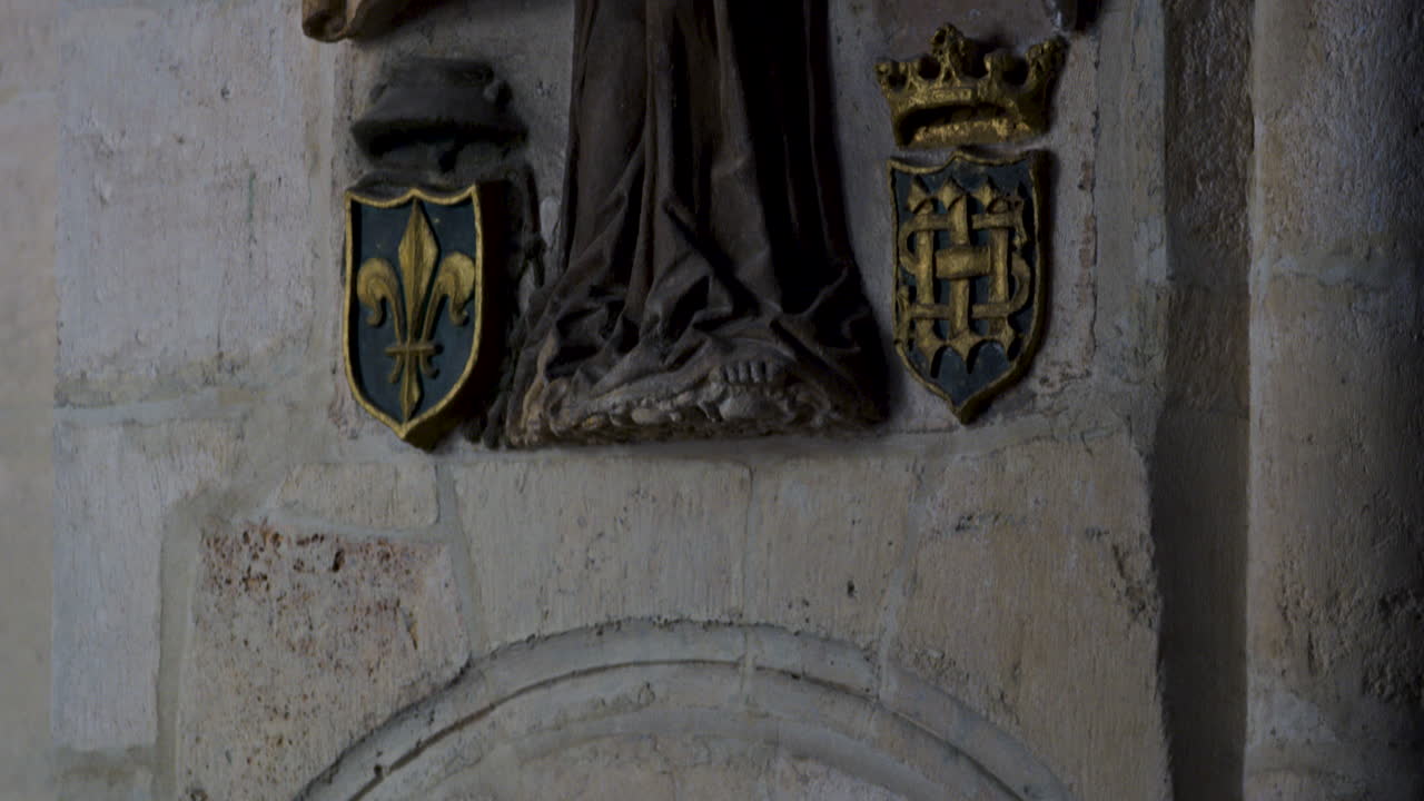 Wall sculptures in Burgos Cathedral, Burgos, Spain, close up tilt up