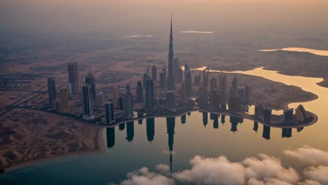 dubai's futuristic cityscape reflects on the calm water below, partially obscured by a layer of low lying clouds, illuminated by the soft glow of the rising sun