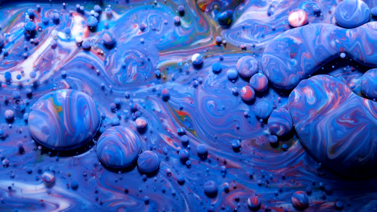 movimiento lento colores brillantes burbujas de aceite hermosa pintura color del universo moviéndose multicolor de cerca. pintura acrílica. fantástica superficie hipnótica. abstracto pintura de colores burbujas estructura de metamorfosis
