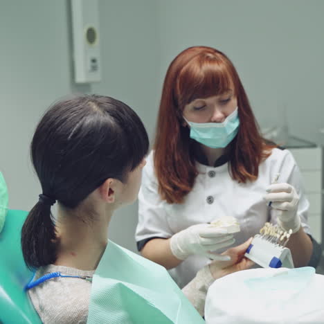 Woman having teeth examined at dentists. Dental clinic.