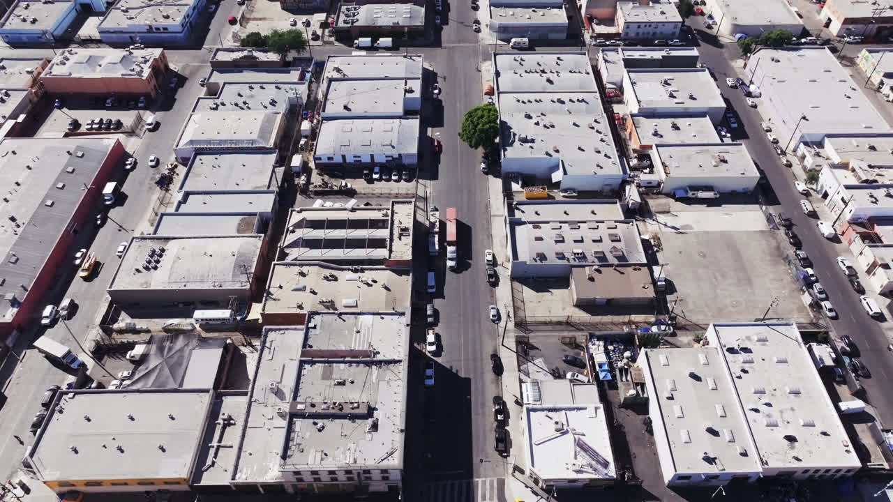 Aerial View of an Urban Commercial or Industrial Area with Buildings and Street