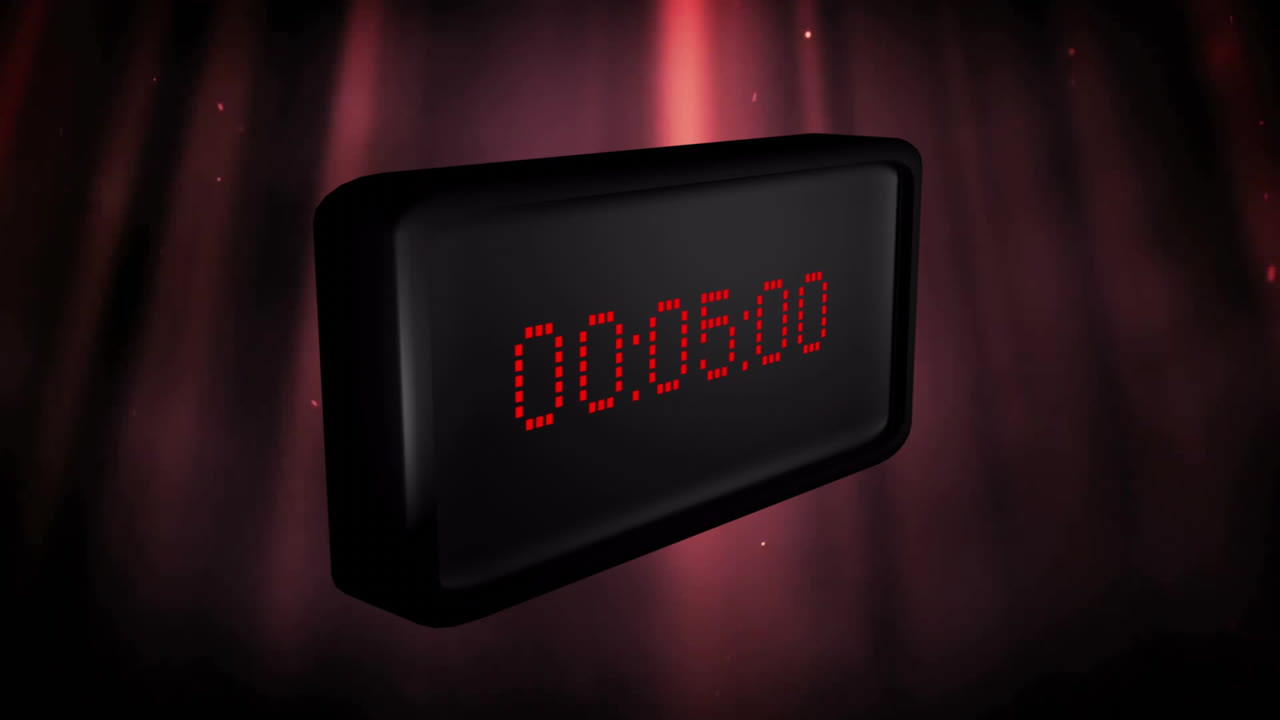 Animation of red digital timer changing with red light trails on black background