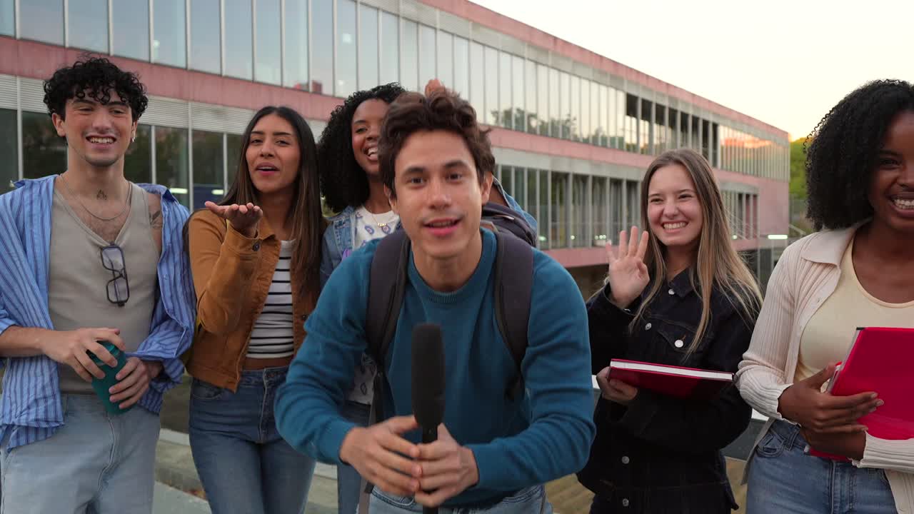 Group of students on campus with microphone