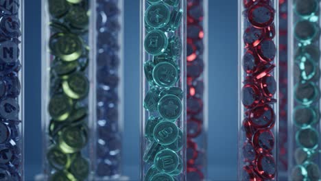 a close-up view of colorful game tokens organized in transparent tubes, showcasing a variety of symbols representing different game elements and mechanics