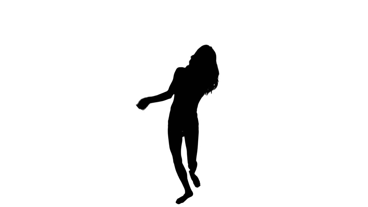 バレエを踊る美しい女性のシルエット