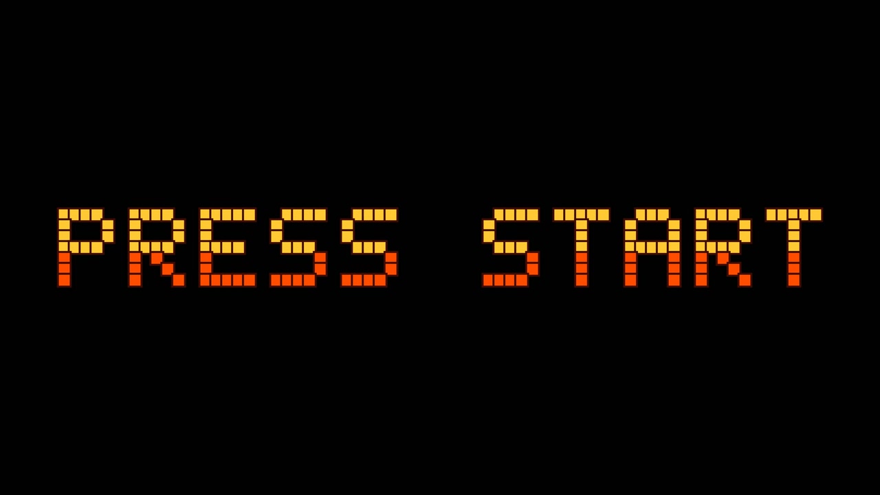 Testo "Press Start" retro pixelato lampeggiante su sfondo nero