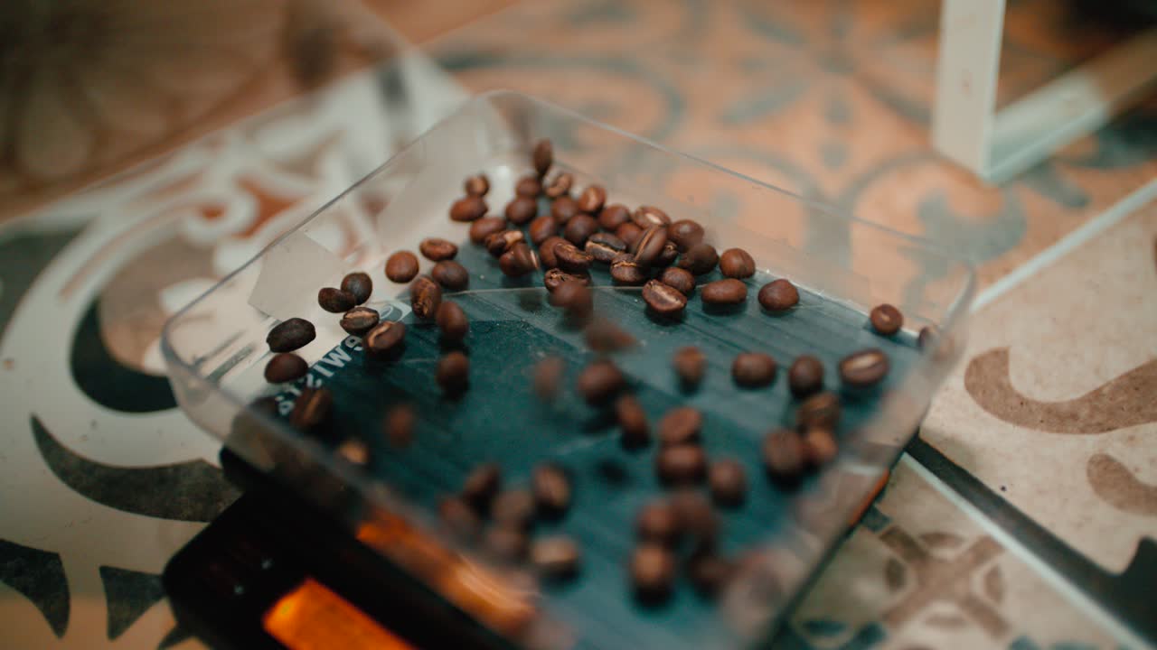 Falling coffee beans in super slow motion in 4K