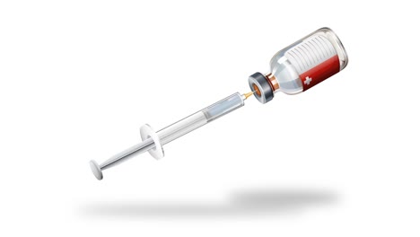una jeringa para extraer líquido de un vial médico