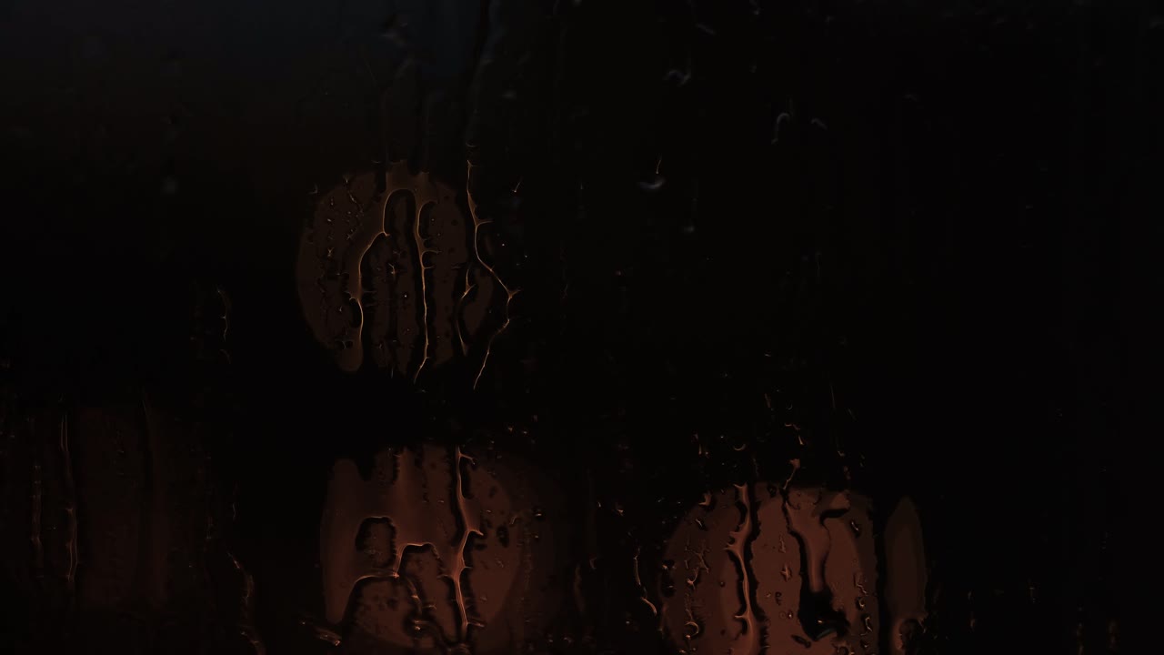 ventana de la noche lluviosa