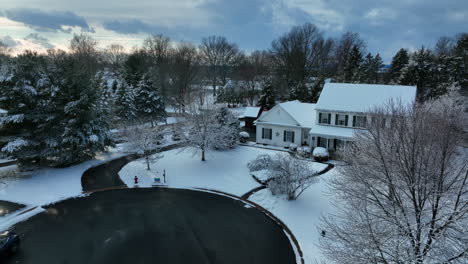 aerial reveal of two story family home in usa