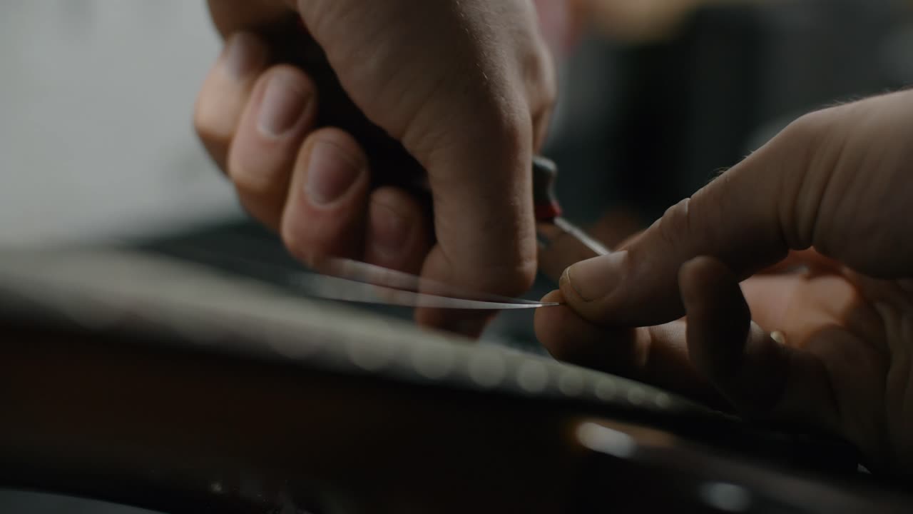 Closeup of Guitar String Replacement