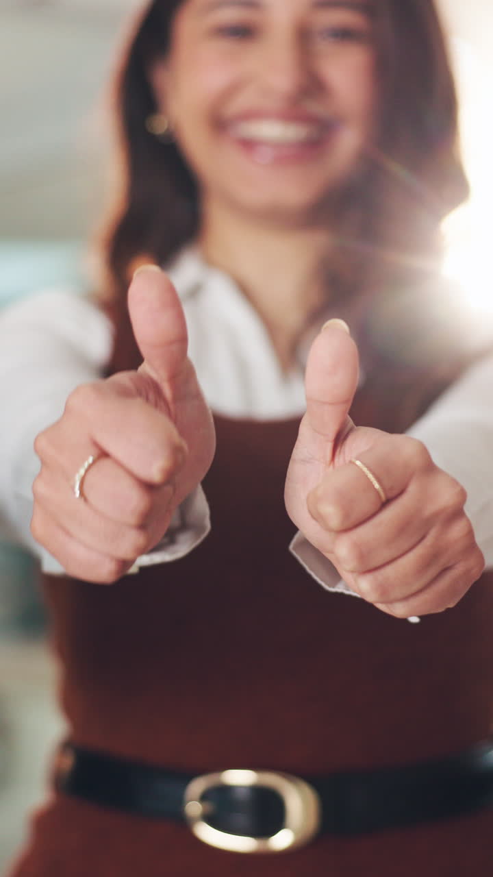 Close Up of Woman Giving Two Thumbs Up Gesture