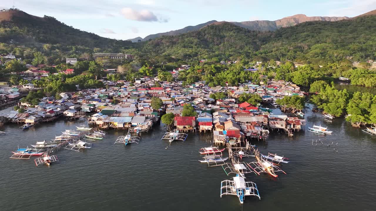 Fishing village, slum on water. Beautiful scenery backdrop. Panoramic. Coron town, Philippines.