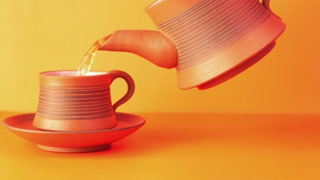 vertiendo té en una taza